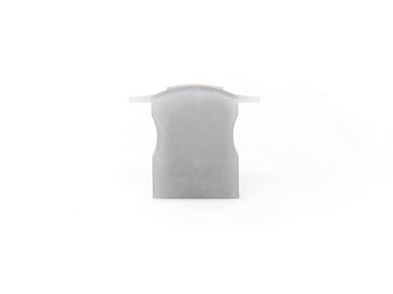 Graues, rechteckiges Kunststoffstück oder Modul auf weißem Hintergrund.