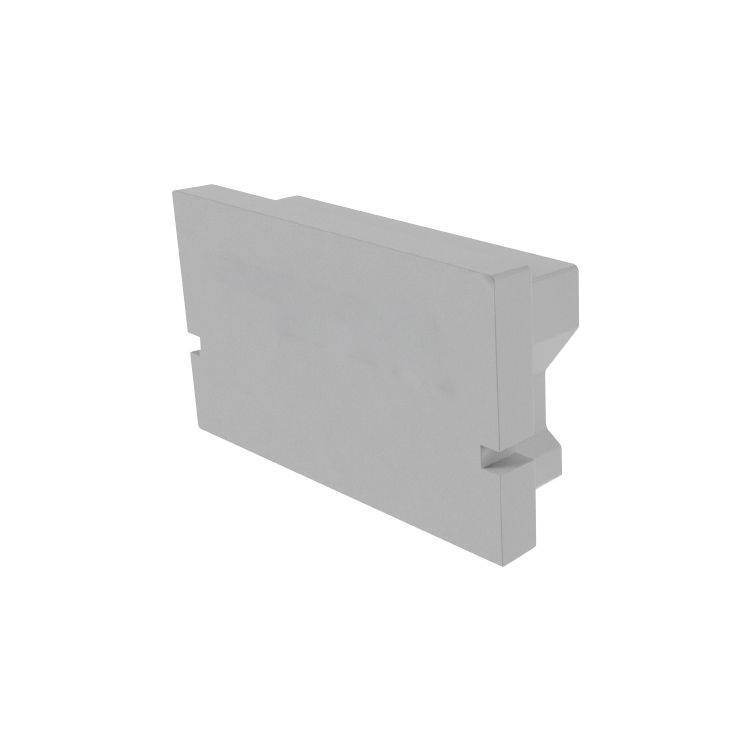 Rechteckiger, grauer Kunststoffblock mit Kerbe auf einer Seite, möglicherweise ein industrielles Bauteil oder Zubehörteil.