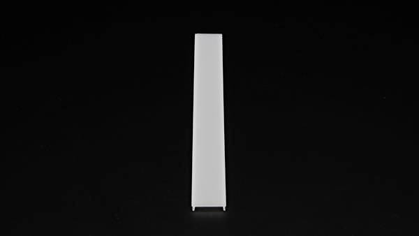 Weißer, rechteckiger Stab auf schwarzem Hintergrund, zentral platziert.