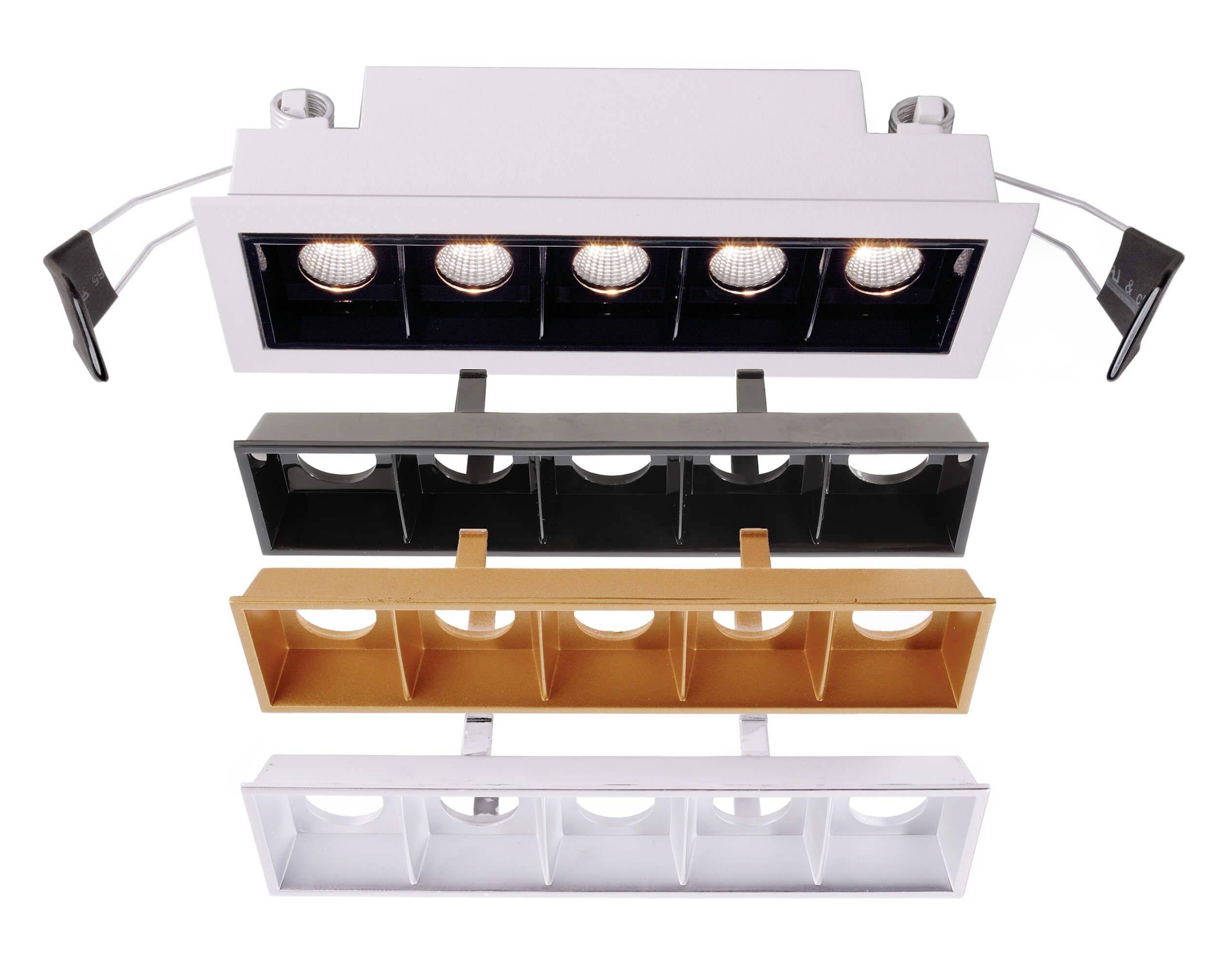 Rechteckige, weiße Deckenleuchte mit mehreren Leuchtmitteln. Drei Anzeigebeispiele mit verschiedenen Rahmenfarben: schwarz, gold, weiß.