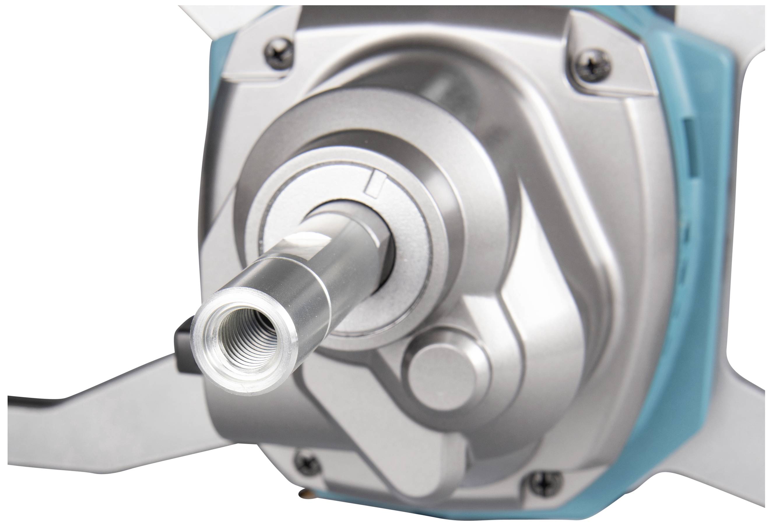 Nahaufnahme eines mechanischen Geräts mit einem hervorstehenden Metallzylinder in der Mitte.