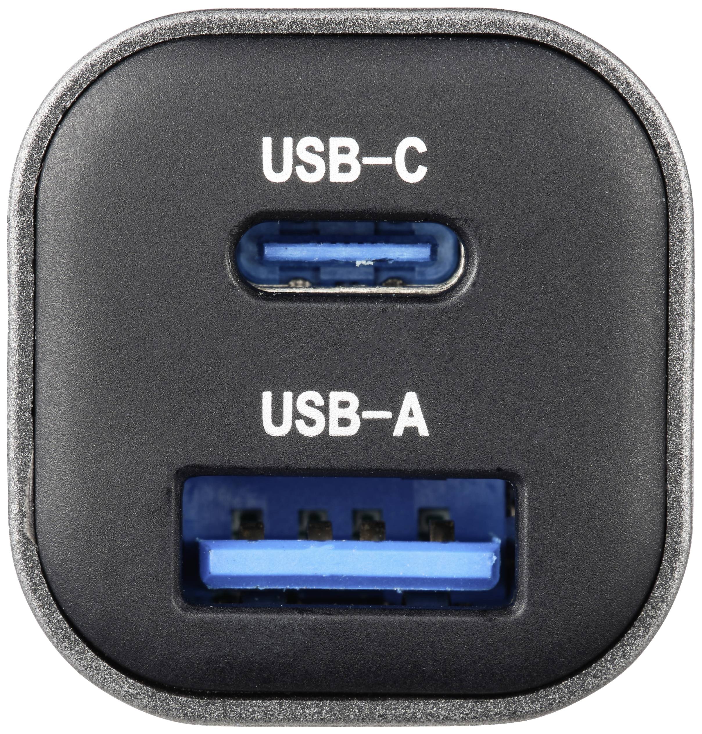 Nahaufnahme eines Ladegeräts mit zwei Anschlüssen, USB-C und USB-A, beide beschriftet. Der USB-C-Anschluss ist oben, USB-A unten.