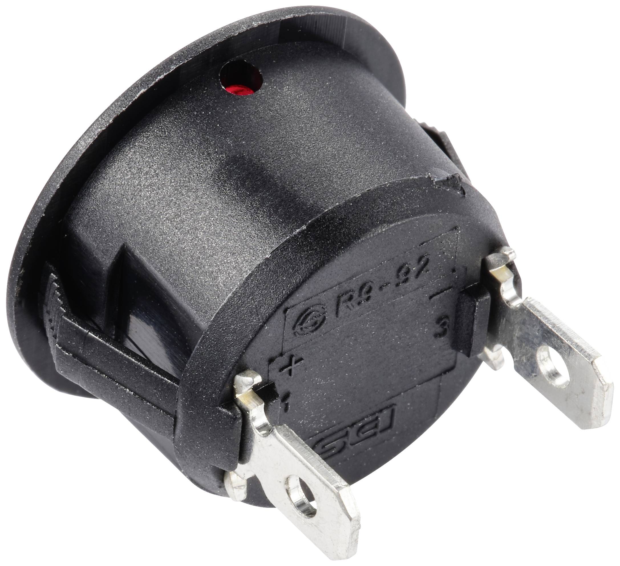 Ein schwarzer runder Kippschalter mit Metallkontakten für elektrische Verbindungen. Auf der Rückseite sind '+' und '-' Symbole sichtbar.