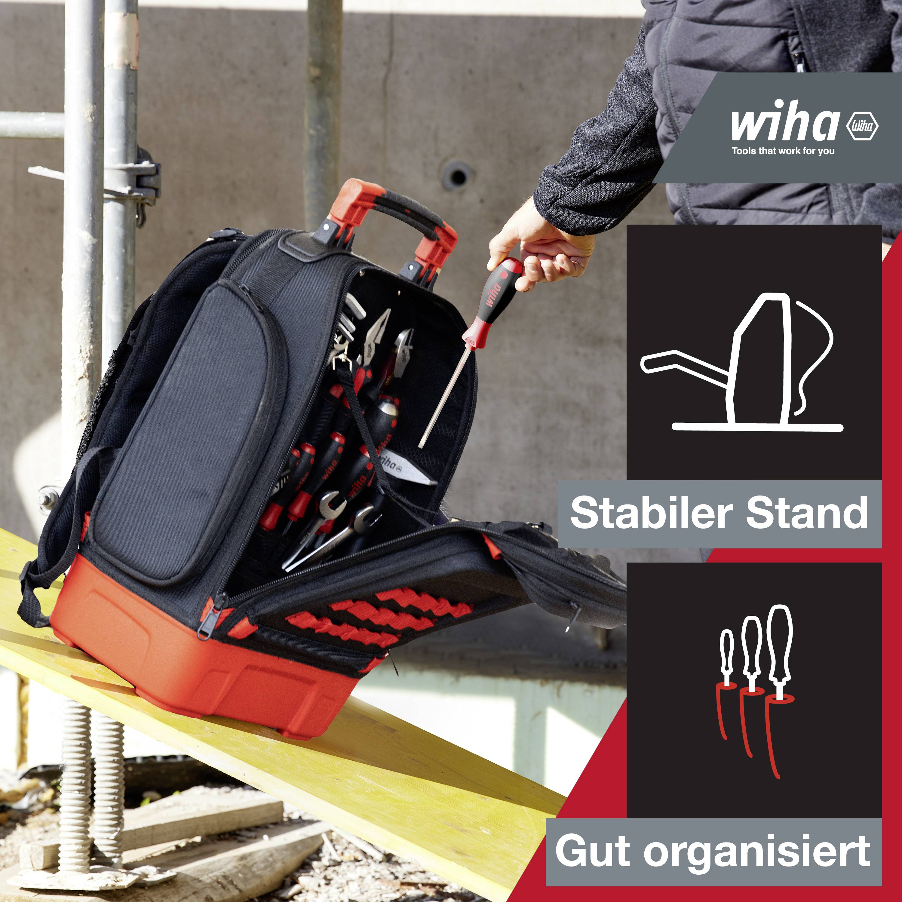 Werkzeugtasche mit stabiler Basis und geöffneter Vorderseite zeigt gut organisierte Werkzeuge. Wiha-Logo oben rechts.