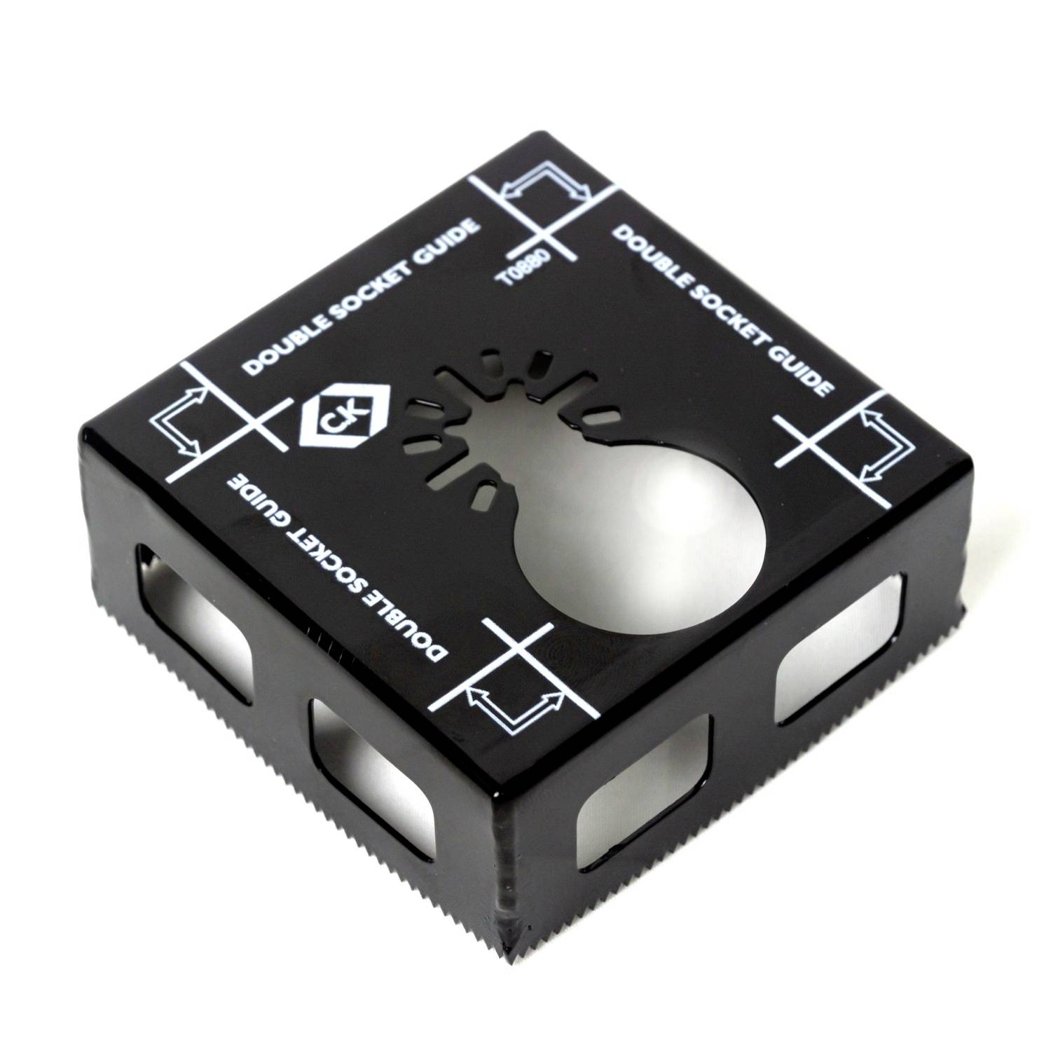 Schwarze Schablone mit Aufschrift Double Socket Guide, birnenförmige Aussparung in der Mitte und Zähne auf der Unterseite.