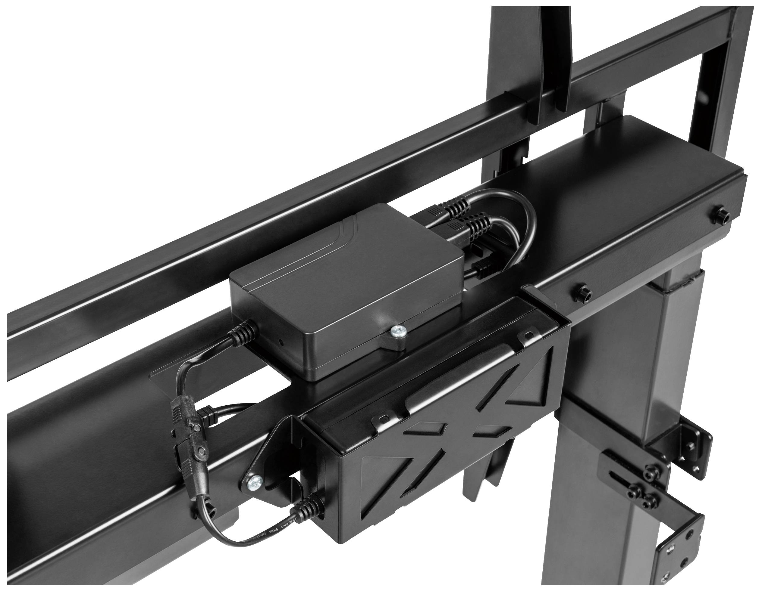 Eine Nahaufnahme eines schwarzen Mechanismus mit Kabeln und Befestigungen, vermutlich Teil eines Hebe- oder Verstellsystems für Möbel.