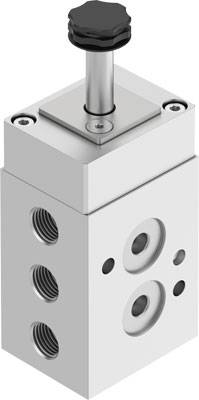 Ein pneumatisches Ventil mit mehreren Anschlüssen und einem schwarzen Knopf an der Oberseite zur Steuerung des Luftstroms.