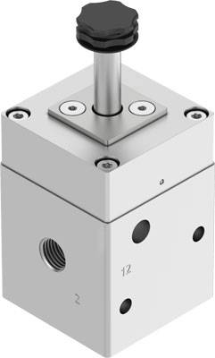 Ein rechteckiges mechanisches Bauteil mit einem schwarzen Drehknopf oben. Es hat mehrere Anschlüsse an den Seiten.