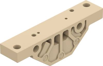 Beigefarbene technische Komponente mit mehreren Bohrungen und strukturierten Vertiefungen, vermutlich ein Teil für mechanische Befestigungen.