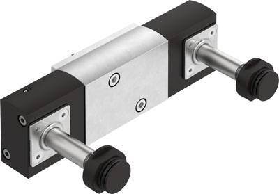 Ein maschinelles Element mit zwei zylindrischen Stäben, die aus einem rechteckigen, metallischen Gehäuse herausragen.