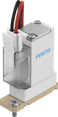 Ein weißes elektrisches Bauteil mit der Aufschrift 'Festo' und roten und schwarzen Kabeln, montiert auf einer Schraubbasis.