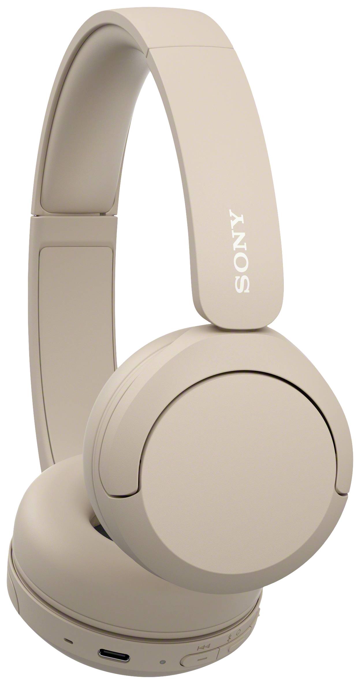 Beige kabellose Kopfhörer von Sony, Modell mit geschlossener Bauweise, geeignet für Musikgenuss und Anrufe.