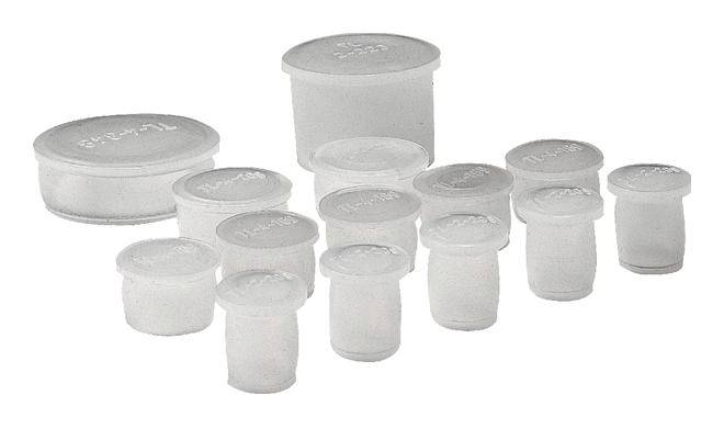 Verschiedene weiße, zylinderförmige Silikondosen in unterschiedlichen Größen.