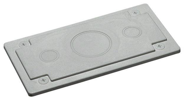 Graue rechteckige Metallabdeckung mit kreisförmigen Erhebungen und Befestigungsschrauben an den Ecken.