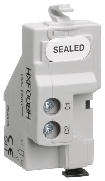 Ein weißes elektrisches Bauteil mit der Aufschrift 'SEALED', zwei sichtbare Schrauben, CE-Kennzeichnung und Modellnummer HX008H.