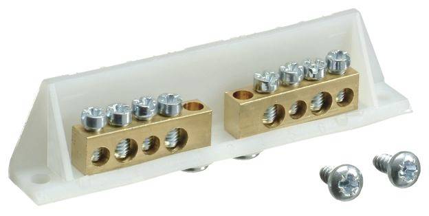 Anschlussblock aus Metall mit mehreren Schrauben, genutzt für die Verbindung von elektrischen Kabeln, zwei separate Schrauben daneben.
