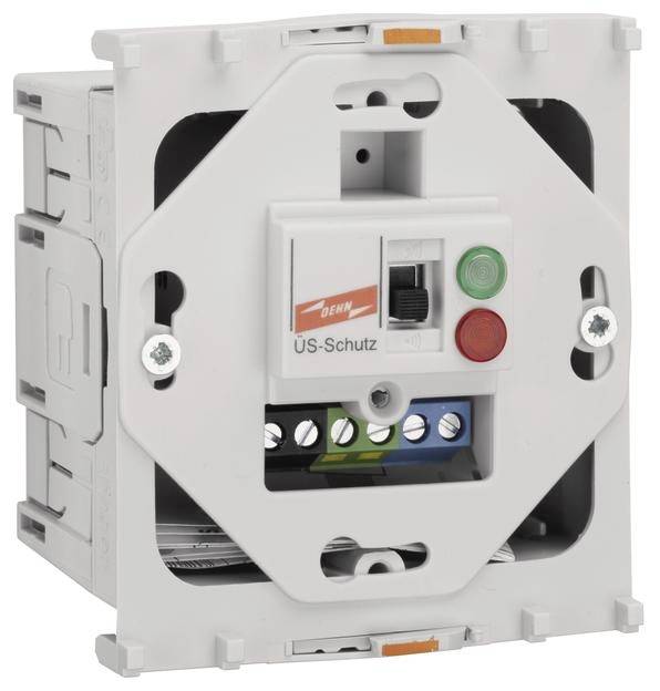 Ein weißer elektrischer Schutzschalter von hinten mit Anschlussklemmen und Bedienknöpfen, markiert mit 'US-Schutz'.