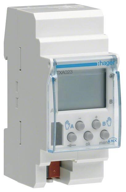 Ein weißer elektrischer Zeitschalter von Hager mit LCD-Anzeige und mehreren Tasten. Modellnummer 'TXA023' ist sichtbar.