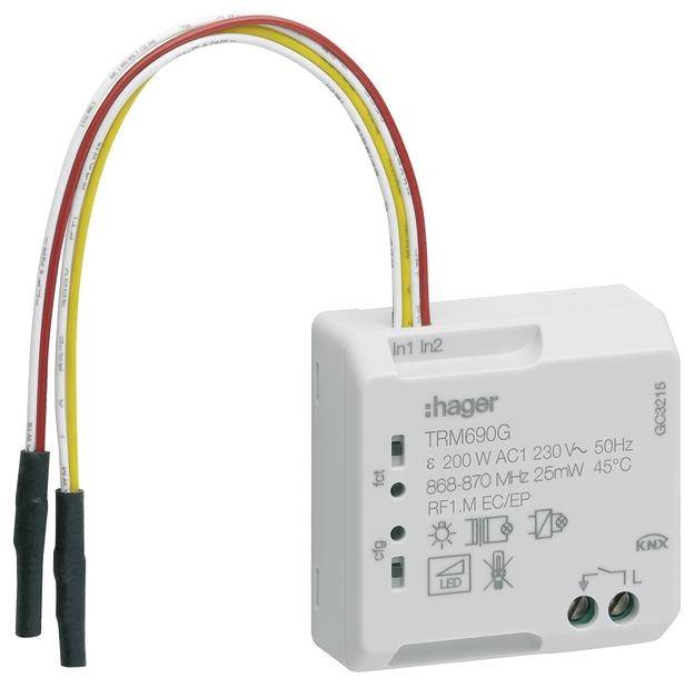 Ein weißes, rechteckiges elektronisches Gerät mit mehreren farbigen Kabeln. Markierungen und Symbole sind auf einer Seite sichtbar.