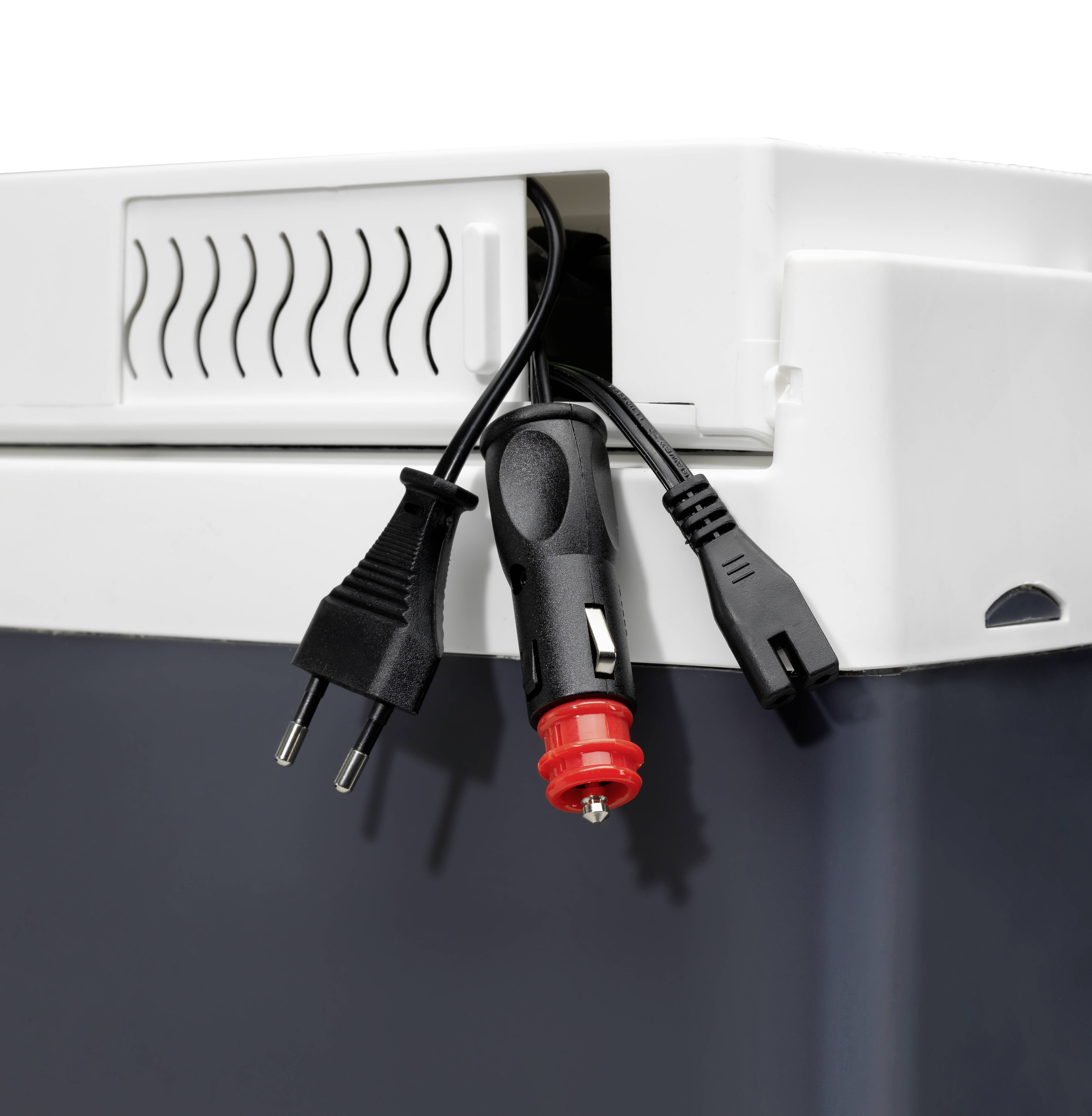 Stromkabel und ein Adapter hängen aus der oberen Ecke eines grauen Geräts. Das Gehäuse hat Lüftungsschlitze.