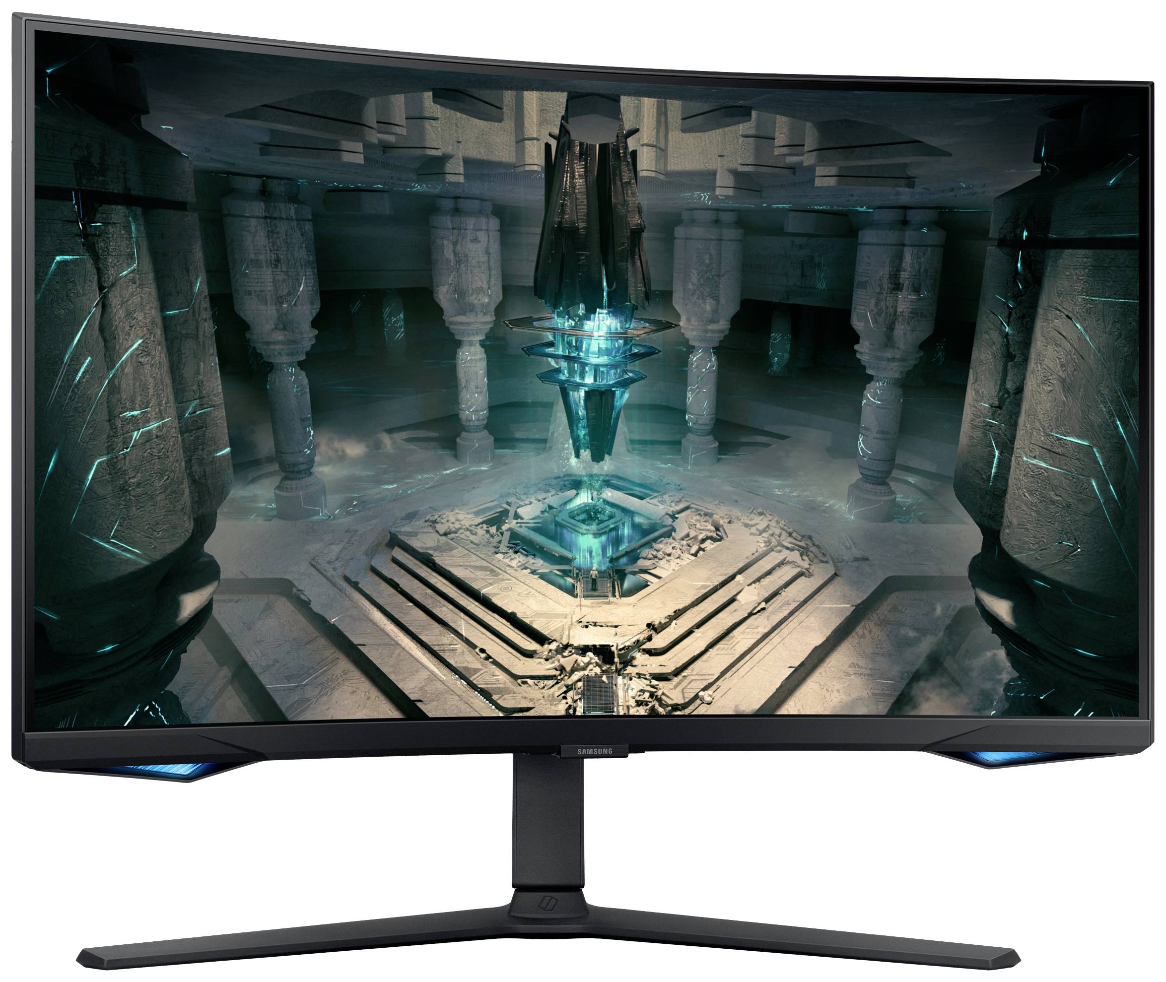 Ein gebogener Gaming-Monitor zeigt eine futuristische Szene mit Säulen und einem leuchtenden blauen Kristall in der Mitte.
