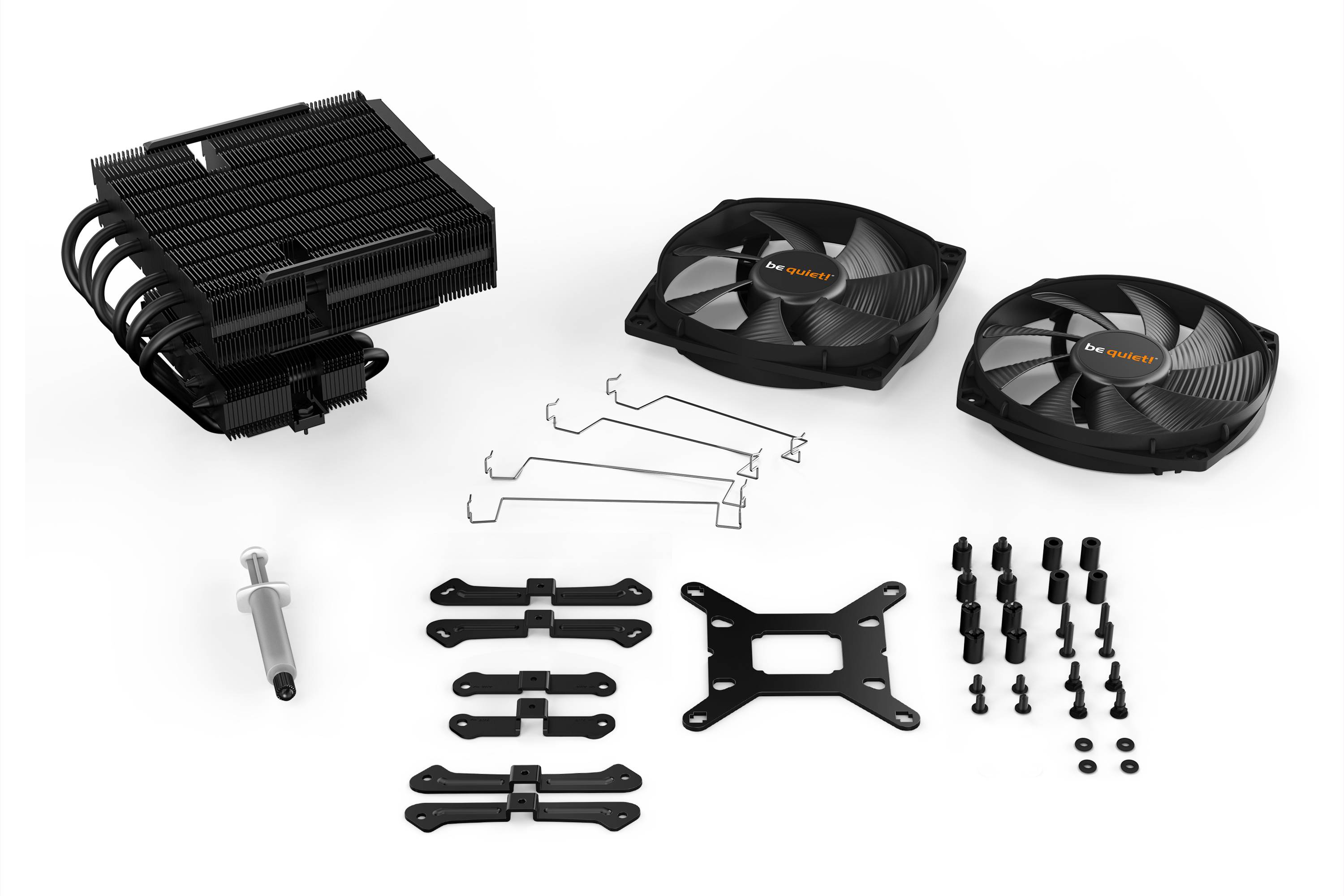 Kühler-Kit bestehend aus zwei Lüftern, Kühlkörper, Spritze mit Wärmeleitpaste, Halterungen und Schrauben zur CPU-Kühlung.