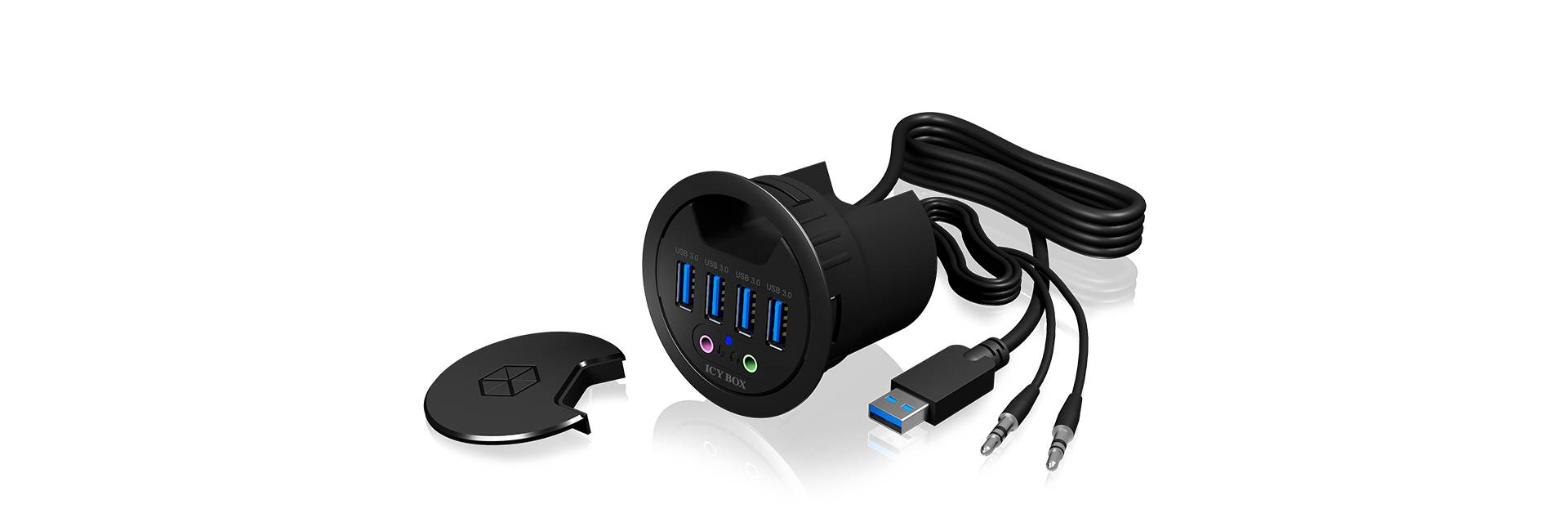USB-Hub in zylindrischer Form mit vier blauen USB-Ports und zwei runden Audio-Anschlüssen. Kabel sind befestigt, Deckel daneben.