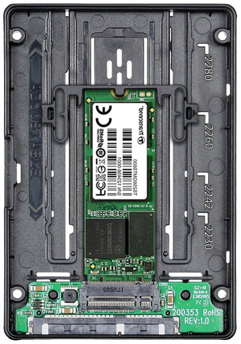 Offene SSD-Festplatte mit sichtbarer Leiterplatte, Steckverbindung und aufgedruckten technischen Spezifikationen.