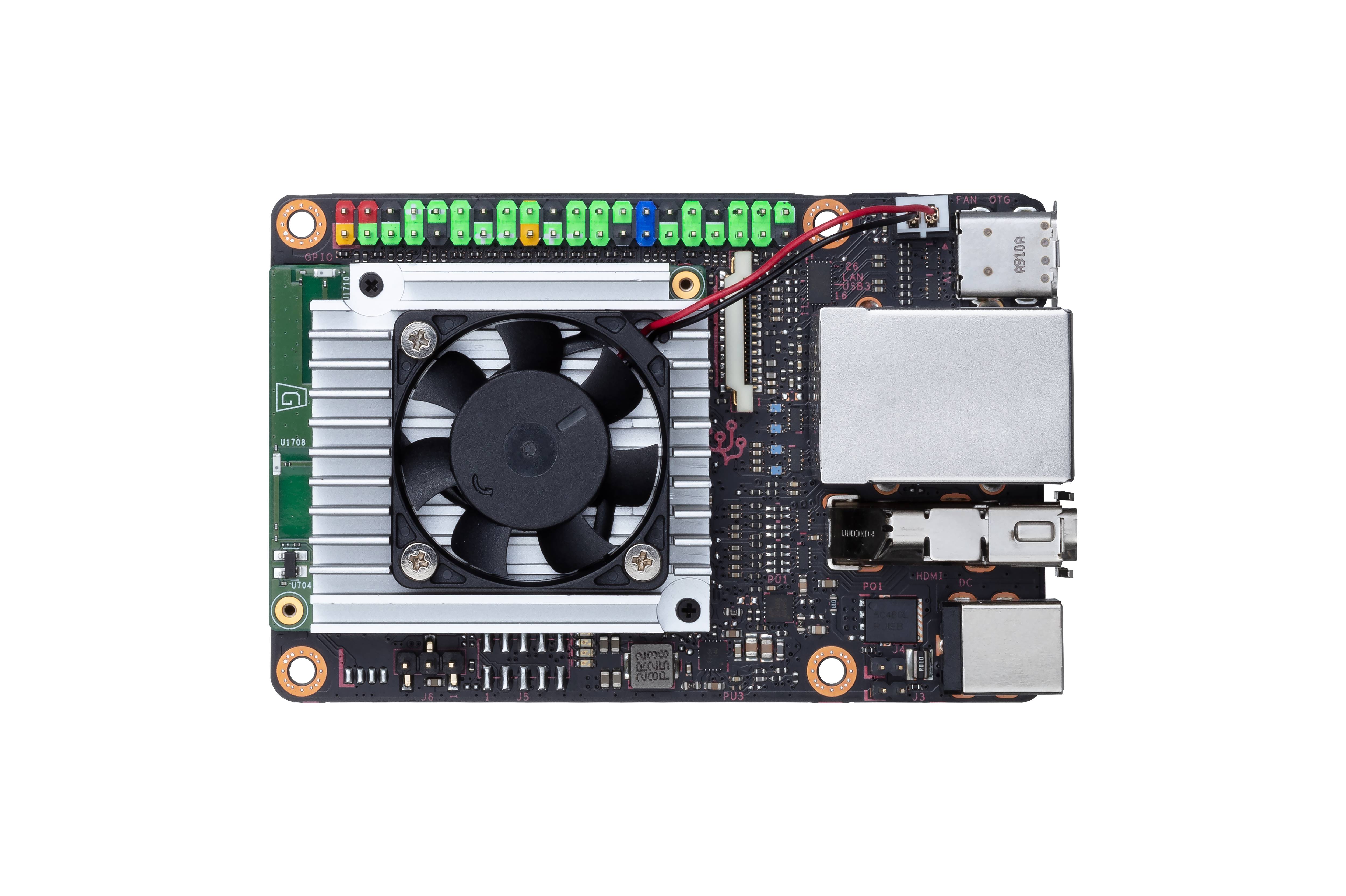 Ein Mini-Computer-Board mit Lüfter, USB- und HDMI-Anschlüssen und diversen elektronischen Komponenten.