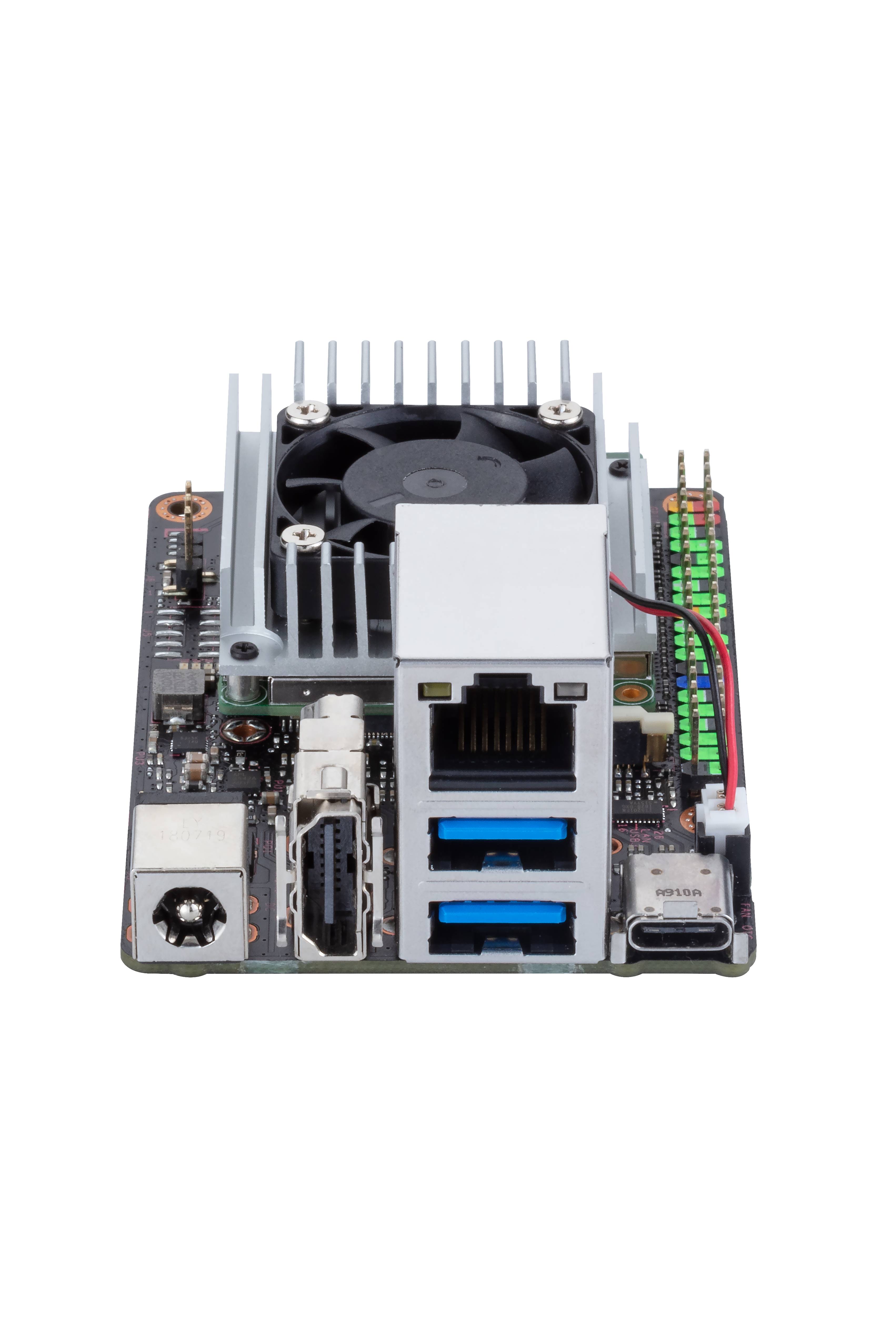 Einzelplatinencomputer mit USB-Anschlüssen, LAN-Port und Kühlkörper. Geeignet für kleine elektronische Projekte und Prototyping.