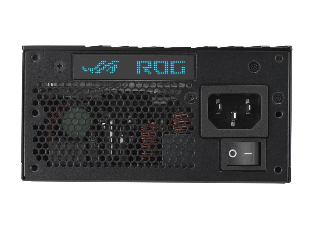 Netzteilrückseite mit Lüftungsgitter, Netzanschluss und Schalter. Die blaue LED-Anzeige zeigt das Logo 'ROG'.