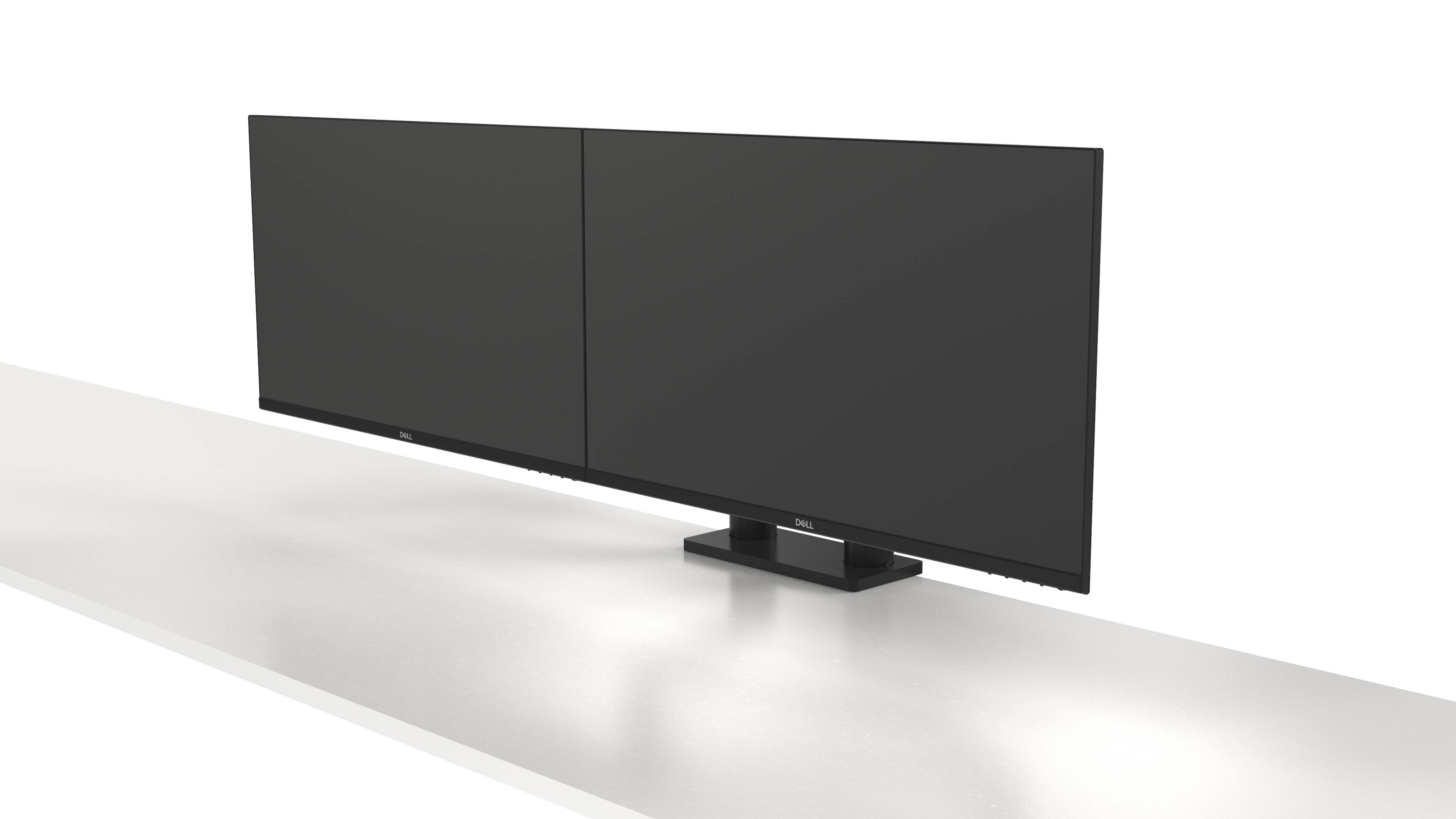 Ein breiter Computerbildschirm steht auf einem weißen Tisch. Der Bildschirm besteht aus zwei nebeneinander stehenden Monitoren.