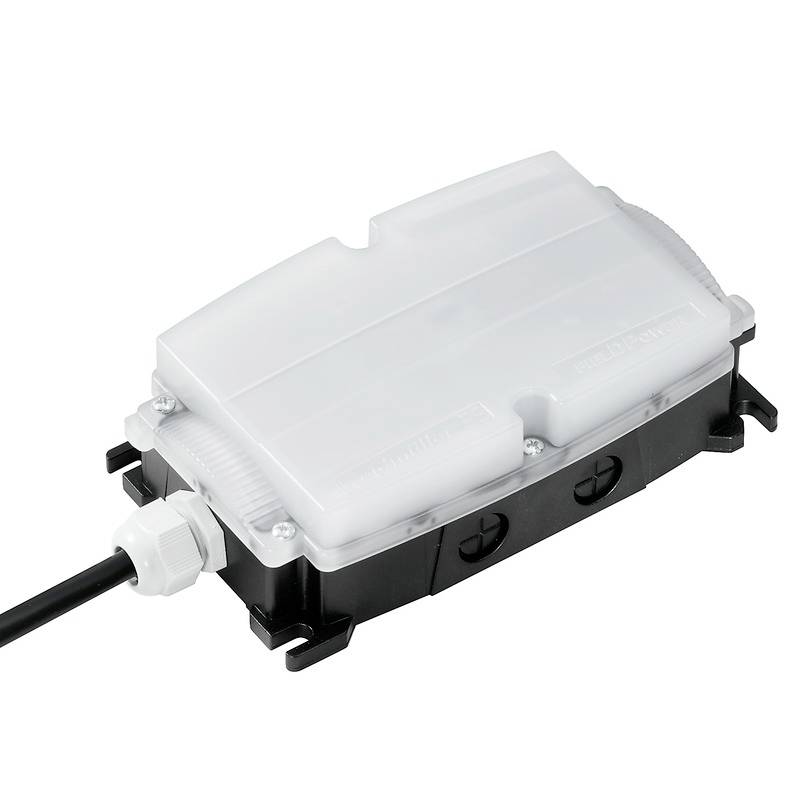 Elektronisches Gerät mit transparentem Gehäuse, Kabelanschluss auf der linken Seite, geeignet für elektrische Verbindungen.