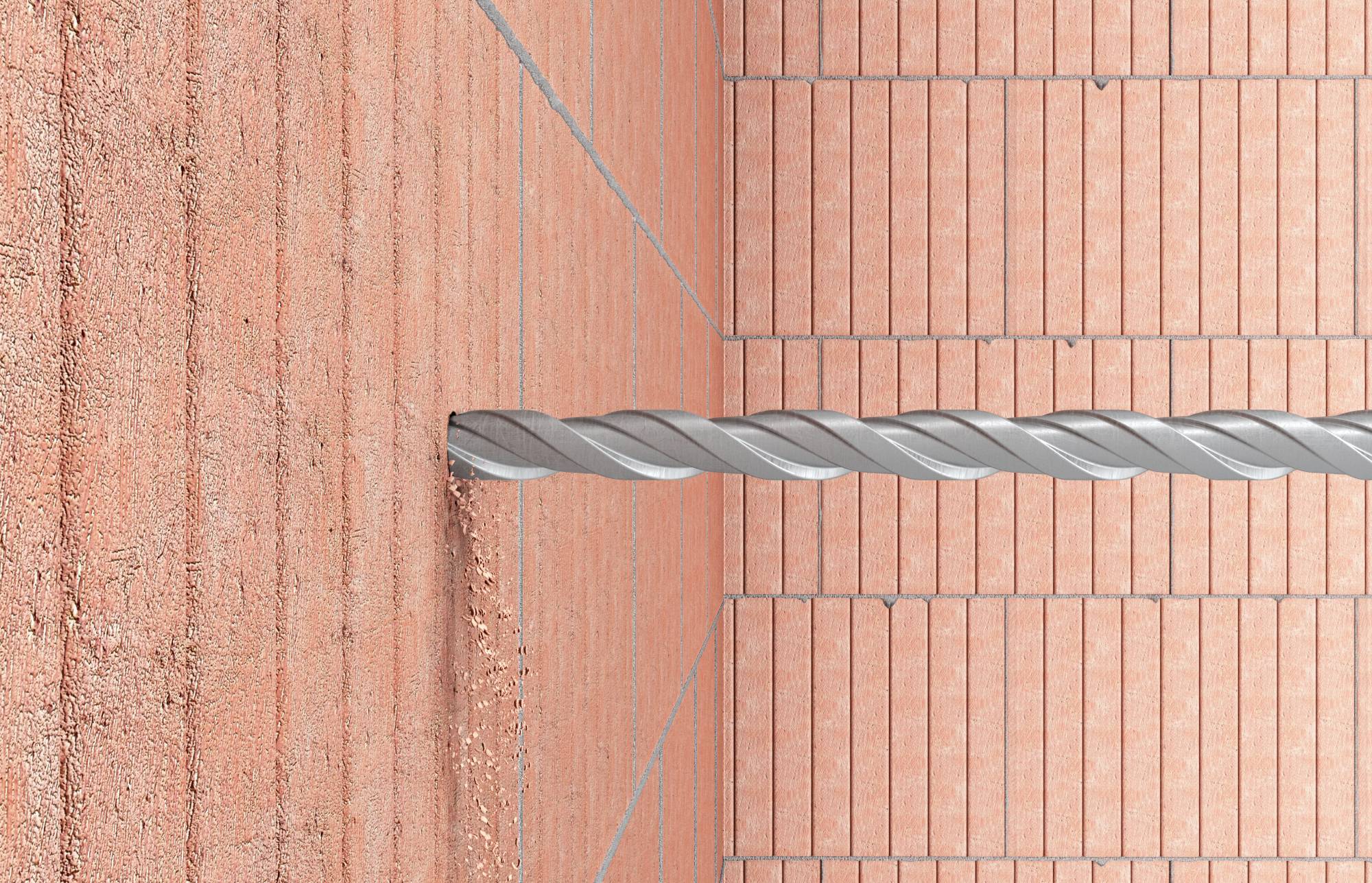 Ein Bohrer durchdringt eine orangefarbene Ziegelwand. Die Nahaufnahme zeigt die Textur der Ziegel und die Spiralform des Bohrers.