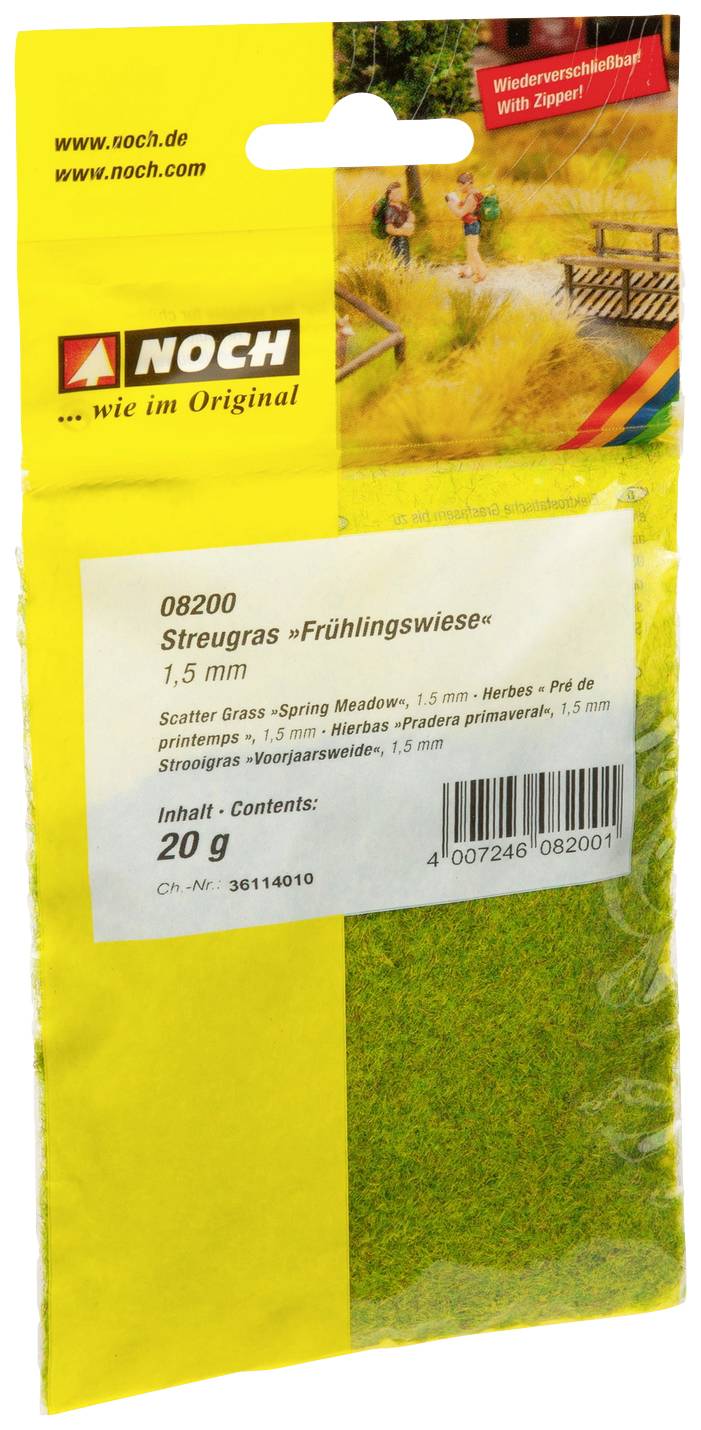 Verpackung mit der Aufschrift 'Streugras Frühlingswiese, 1,5 mm'. Enthält 20 g Modellbau-Material. Bild von grünem Gras als Inhalt.