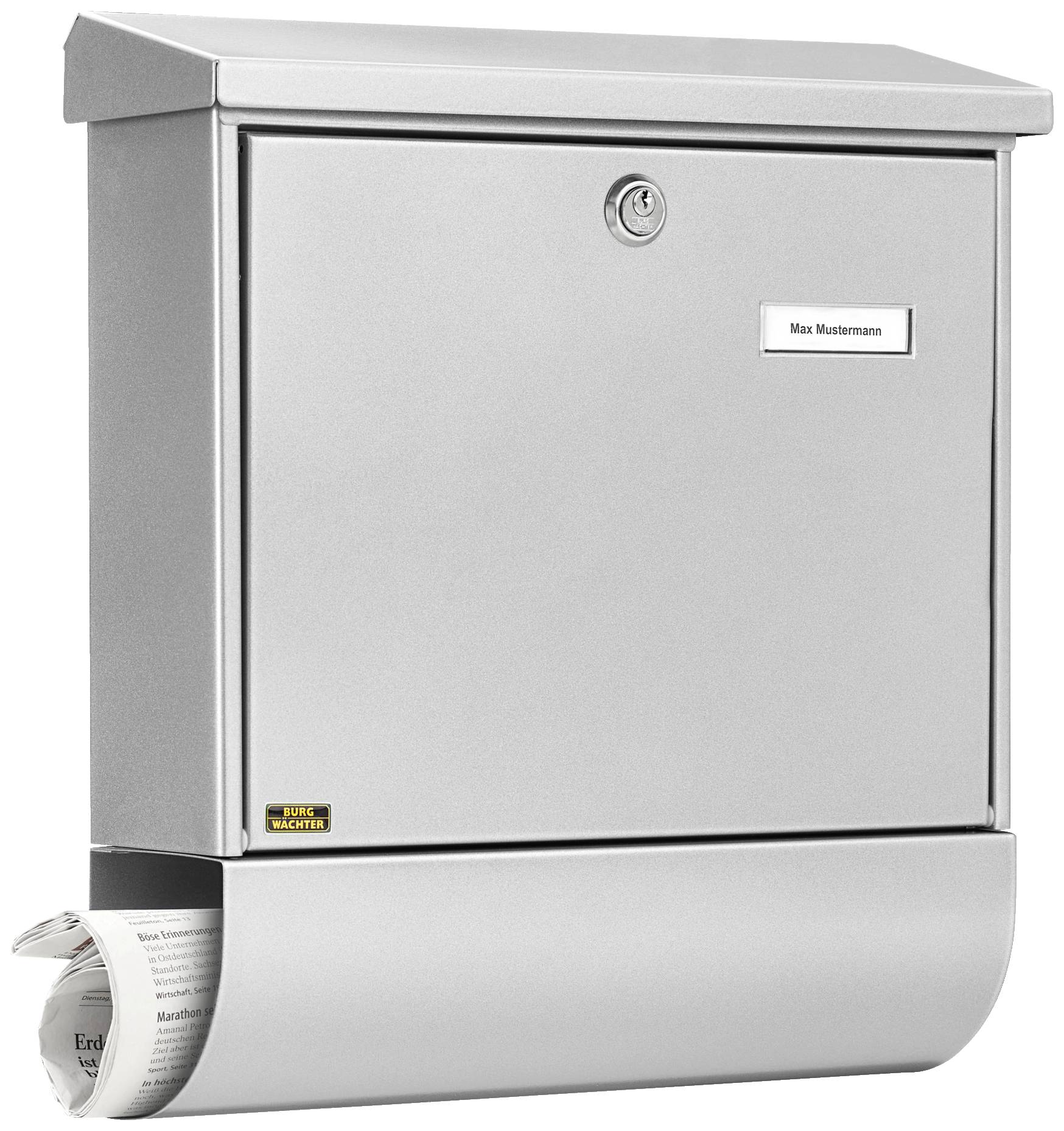 Ein silberner Briefkasten mit Zeitungsfach unten. Namensschild mit 'Max Mustermann'. Briefkasten ist geschlossen.