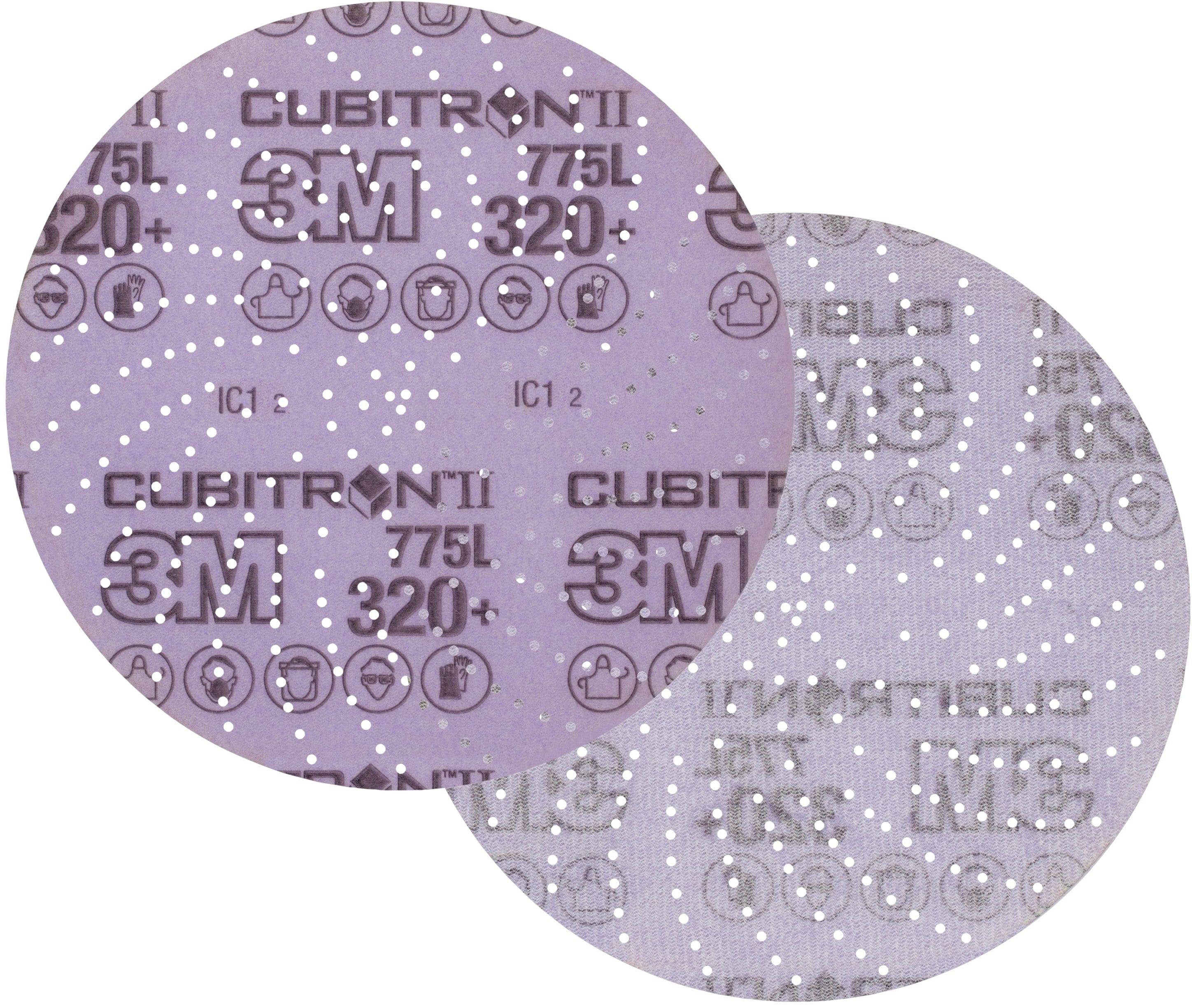 Zwei Schleifscheiben mit lila und grauer Farbe, mit der Aufschrift 'Cubitron II 3M 775L 320+ und verschiedenen Piktogrammen.