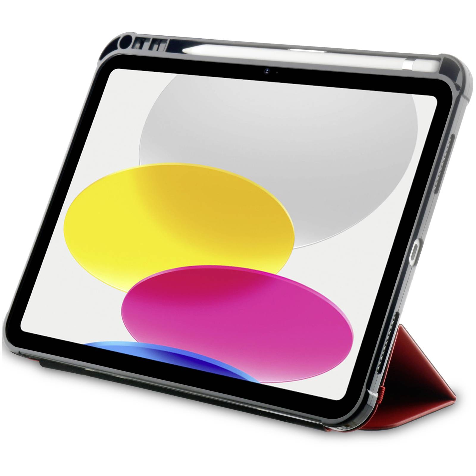 Tablet mit einem bunten Bildschirm, zeigt gelbe, rosa und graue Ovalformen. Liegt auf einer roten Hülle.