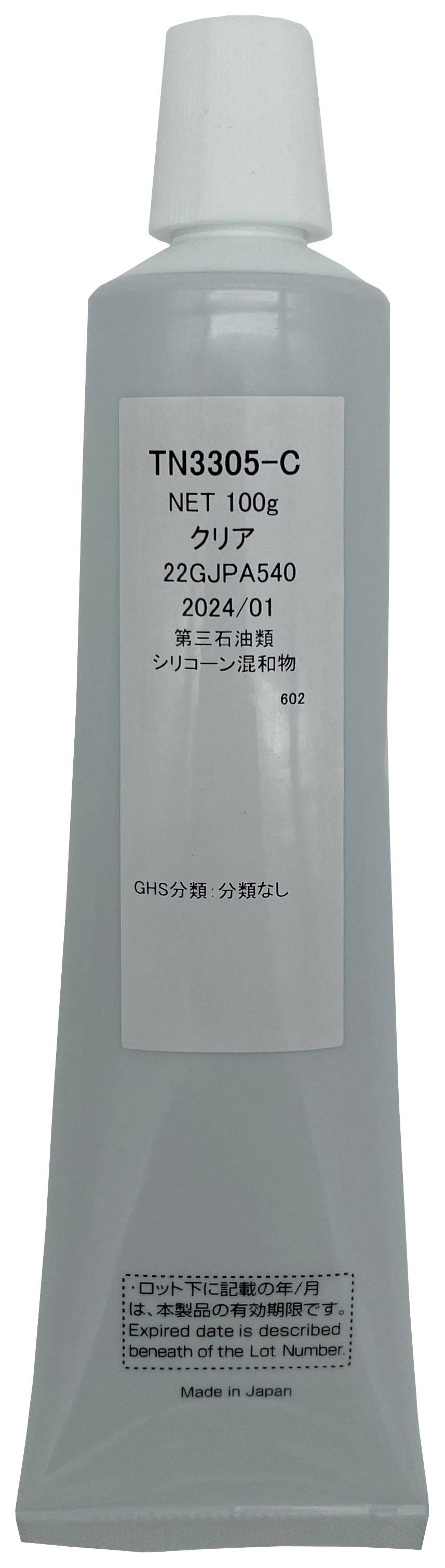 Eine graue Tube mit einem Etikett in japanischer Schrift. Enthält technische Informationen und ist unten mit 'Made in Japan' gekennzeichnet.