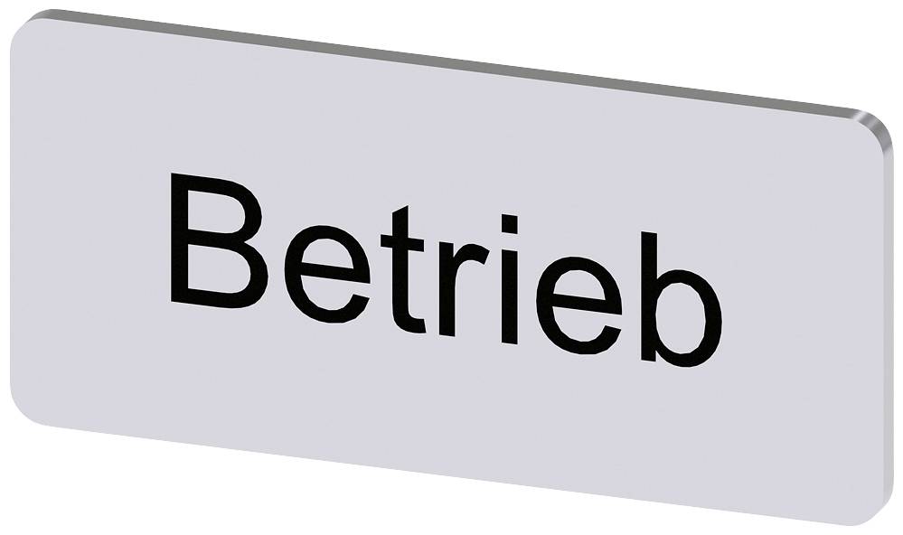 Ein rechteckiges Schild mit dem Wort 'Betrieb' in schwarzer Schrift auf einem hellen Hintergrund.