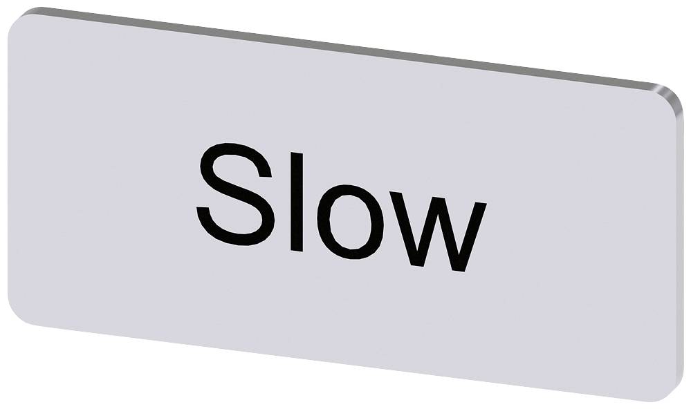 Ein rechteckiges Schild mit der Aufschrift 'Slow' in schwarzer Schrift auf grauem Hintergrund.
