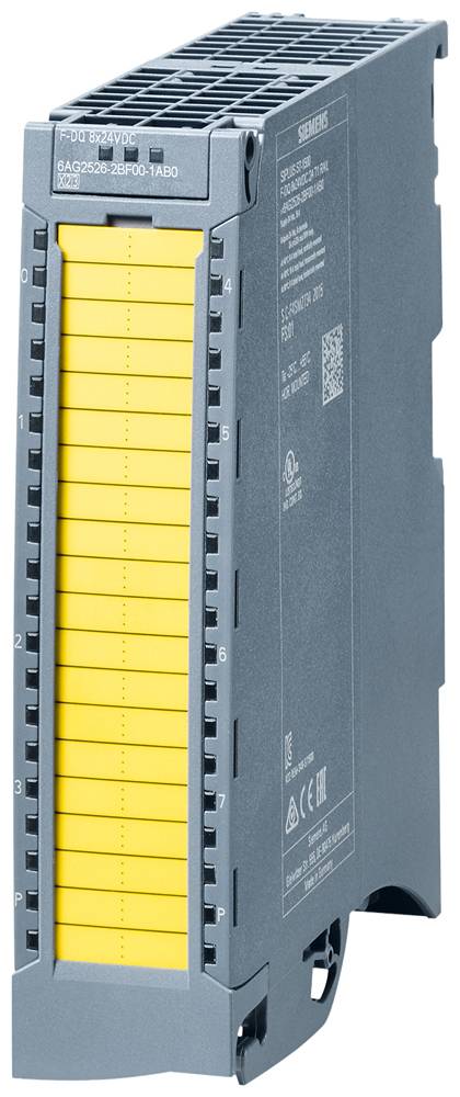 Ein elektronisches Modul mit gelben und grauen Elementen, vermutlich ein Industrieautomationsgerät, steht aufrecht auf einer weißen Fläche.