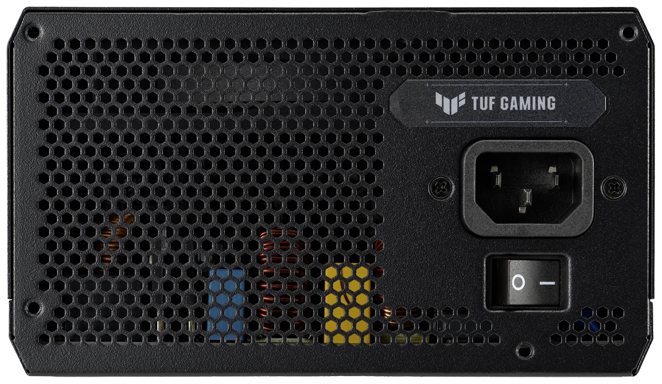 Schwarzes Computer-Netzteil mit Lüftungsgitter links, Netzschalter und Stromanschluss rechts. Oben steht 'TUF Gaming'.