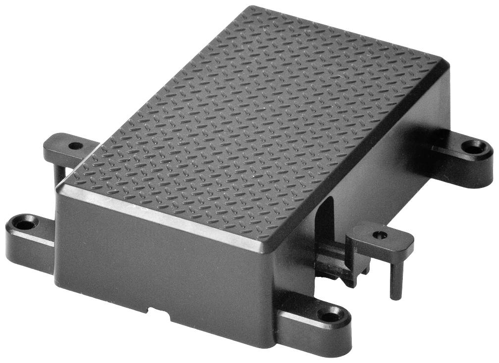 Ein rechteckiges, schwarzes Gerät mit strukturierter Oberfläche und mehreren Befestigungslaschen, möglicherweise ein Elektronikgehäuse.