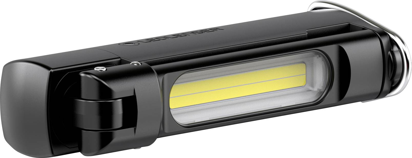 Schwarze LED-Taschenlampe mit gelbem Leuchtstreifen in der Mitte, liegt horizontal auf einer Oberfläche.