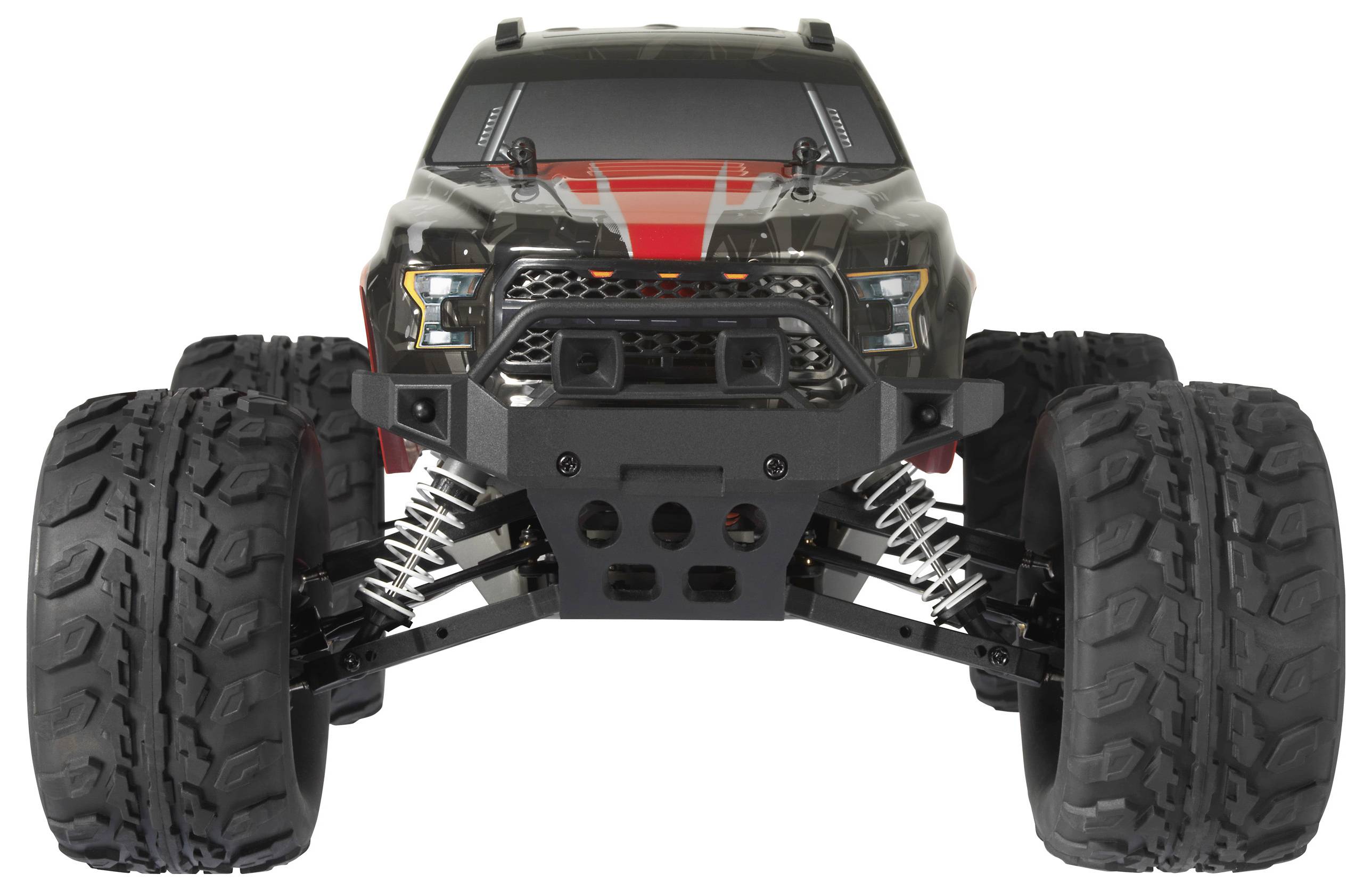 Ferngesteuerter Monstertruck mit großen, grobstolligen Reifen, robuster Stoßstange und schwarz-rotem Karosseriedesign, frontal aufgenommen.