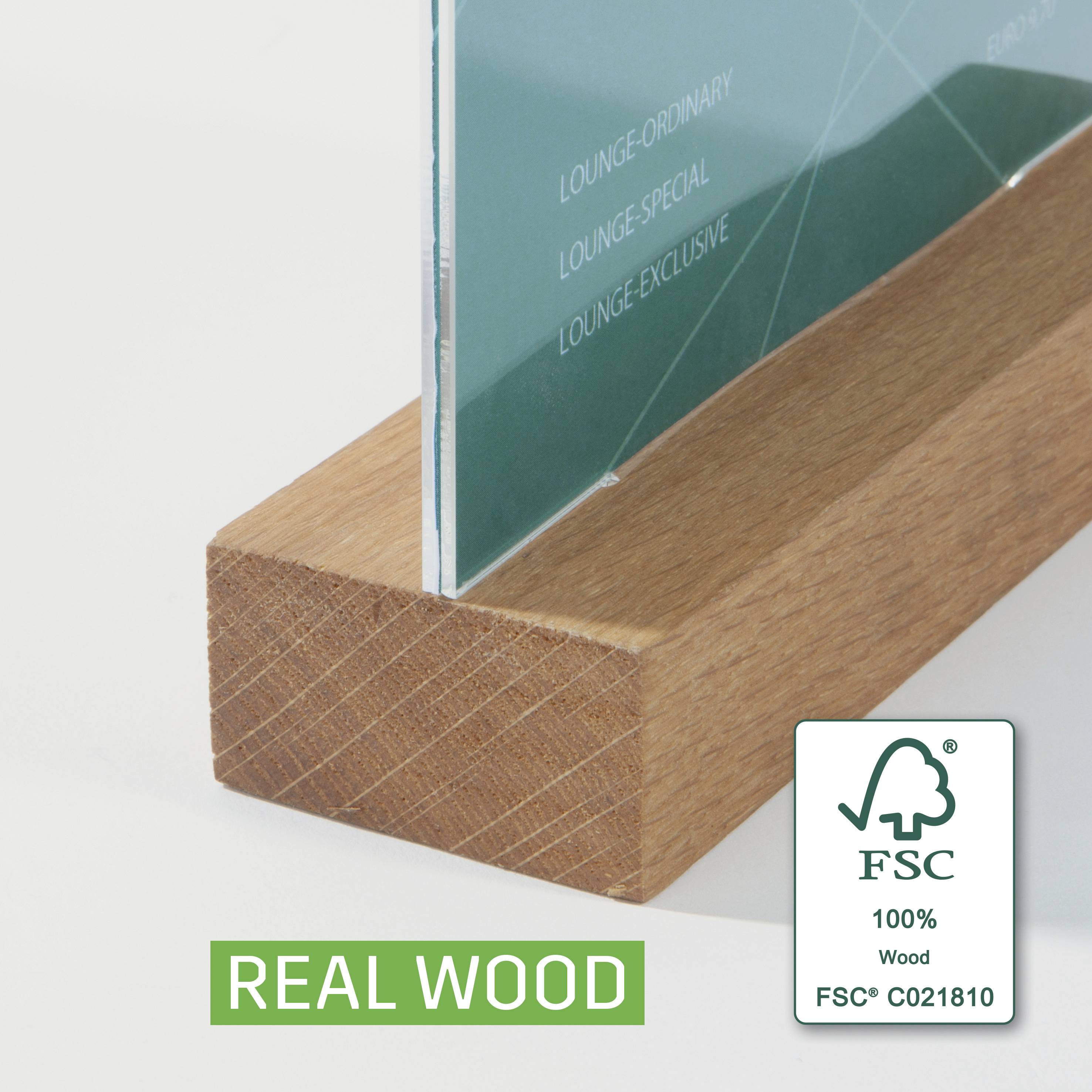 Ein Glasbild auf einem Holzsockel mit dem FSC-Logo und der Beschriftung 'REAL WOOD'. Das FSC-Gütesiegel steht für nachhaltige Forstwirtschaft.