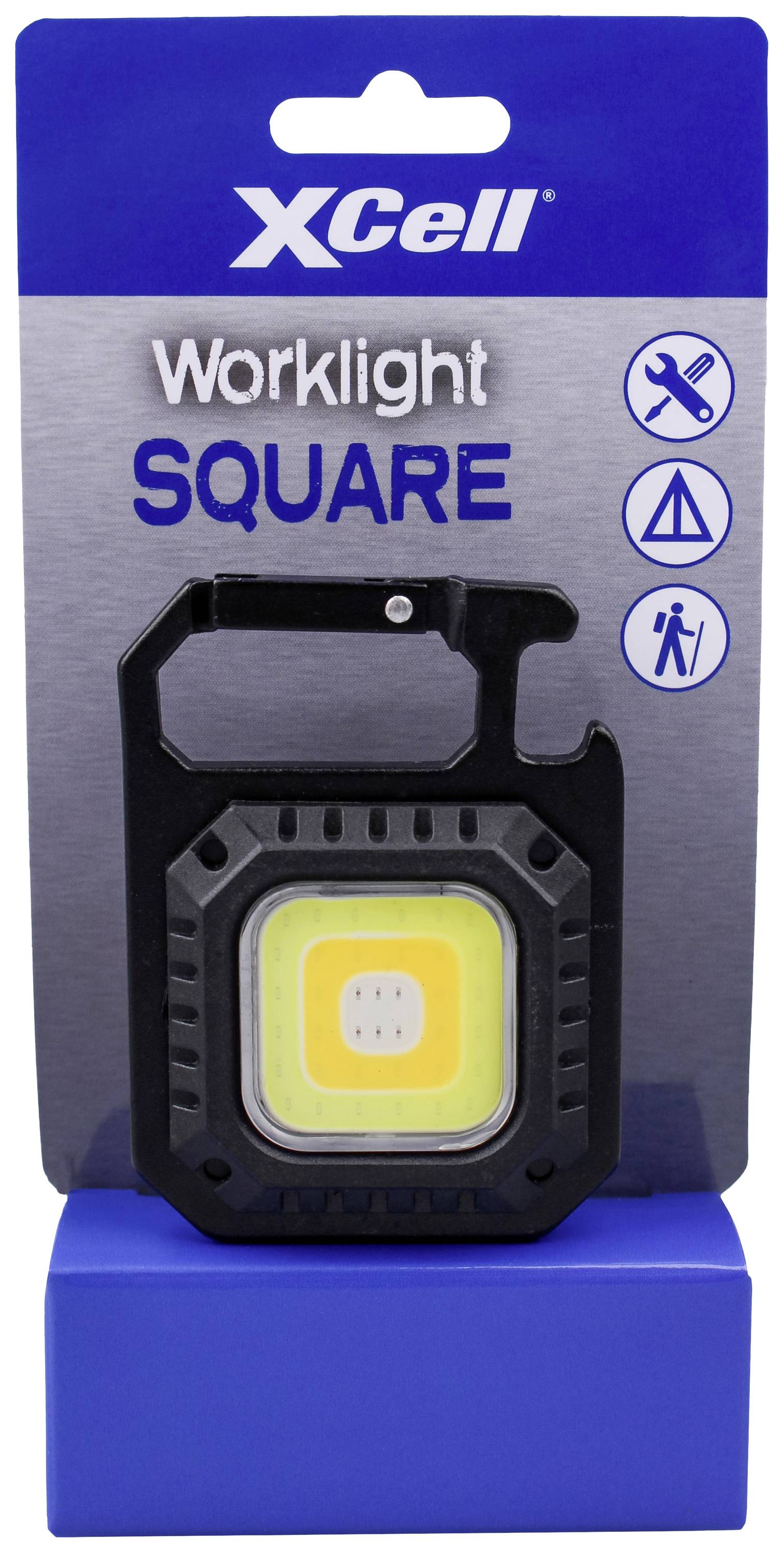 Schwarzes quadratisches Arbeitslicht von XCell auf blauer Verpackung. Text: 'Worklight SQUARE'. Symbole: Werkzeuge, Zelt, Person.