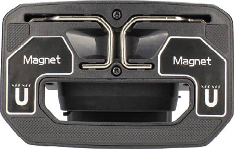 Ein Ladegerät mit zwei Steckplätzen, gekennzeichnet mit 'Magnet'.