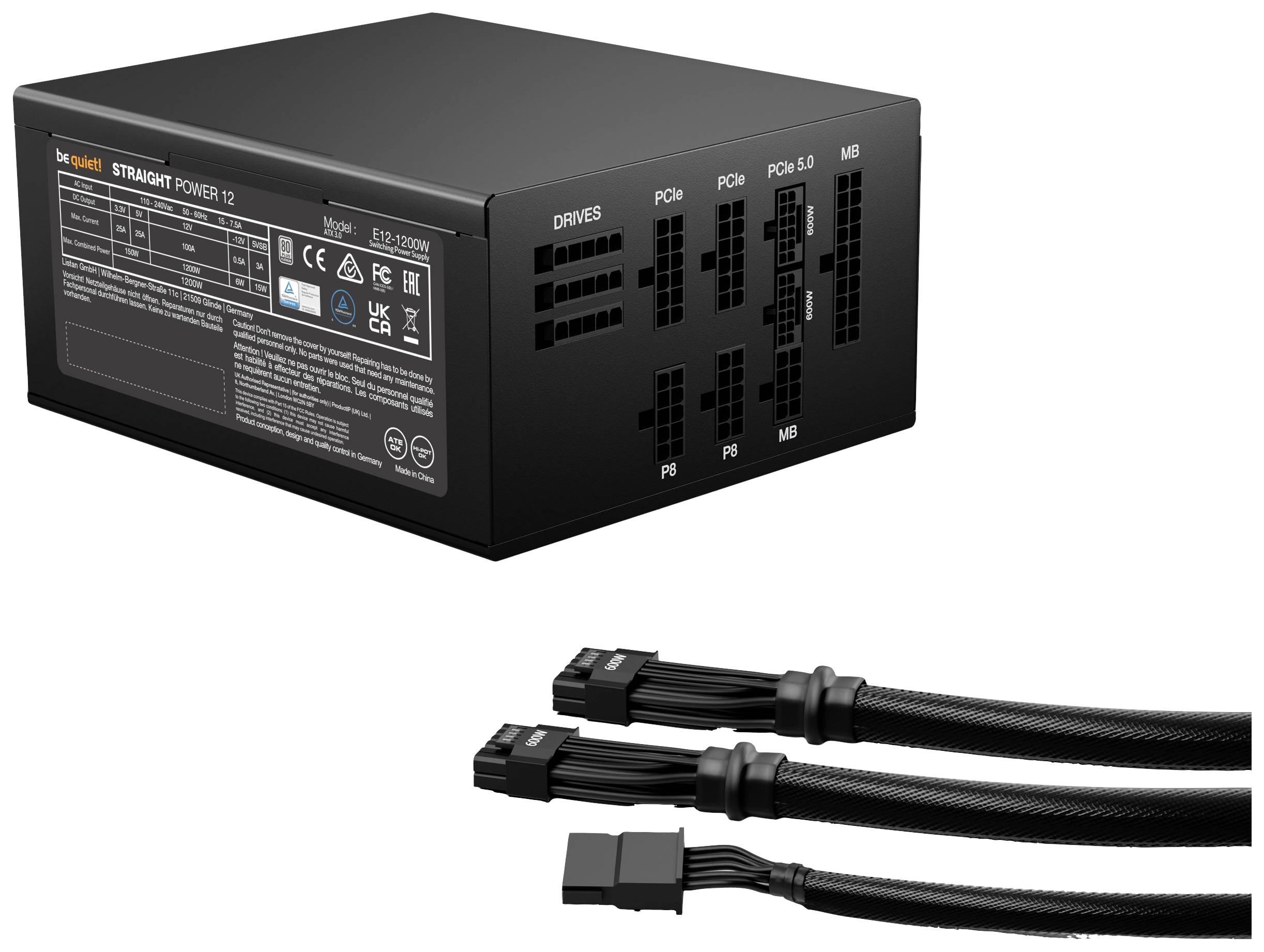 Schwarzes Netzteilmodul von be quiet! Straight Power 12 mit mehreren Anschlüssen. Darunter liegen zwei schwarze Stromkabel mit Steckern.